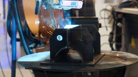 The sample of the robot arm during welding process, automatic work, technology Stock Footage 113336669