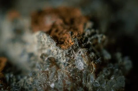 A sample of rock with amethyst under great magnification. Mountain mineral with Stock Photos