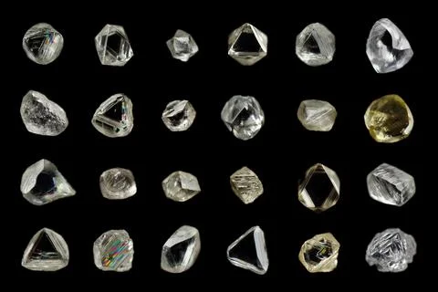 Sample of rough diamond crystals 库存照片