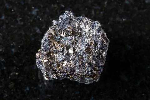 Sample of rough native bismuth mineral on black Stock Photos