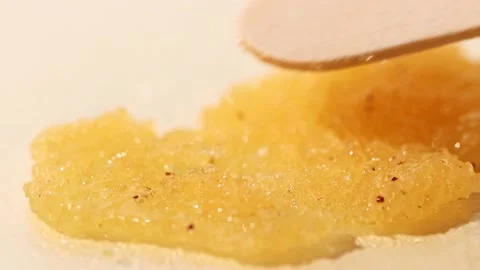 Sample sugar scrub orange macro. Beauty product for spa and massage Stock Footage 232371458
