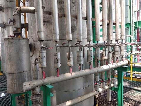 Sample valve of a distillation column. Stock Photos