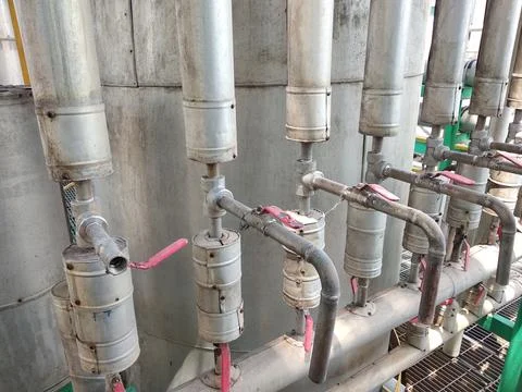 Sample valve of a distillation column. Stock Photos