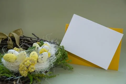 Sample of white empty envelope template Handmade Easter wreath festive yellow Stock Photos