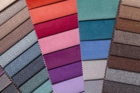 Sample of woven textile different colors, background. Stock Photos