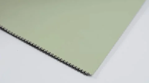 Samples of artificial leather. Multicolored sheets of leather are placed on the  Stock Footage 157045905