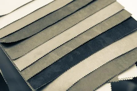 Samples of artificial suede. Sheets of suede fabric close-up. Stock Photos