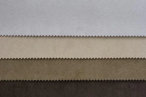 Samples of artificial suede. Sheets of suede fabric close-up. Stock Photos