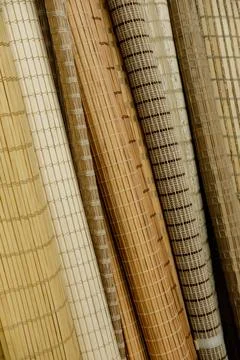 Samples of bamboo curtains for windows in a store Фото