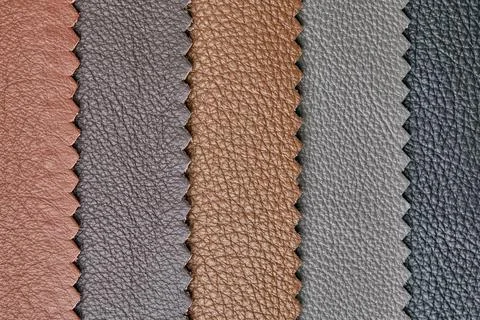 Samples of beige, brown, gray black leather. Leather crafts and craftwork. View Stock Photos