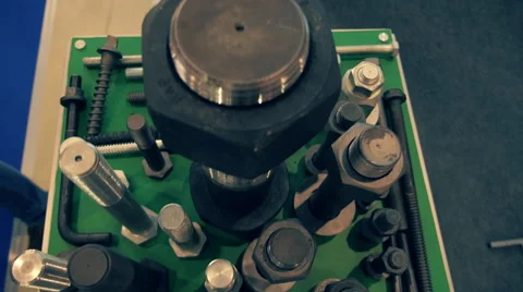 Samples of both large and small metal screws Stock Footage 68351873