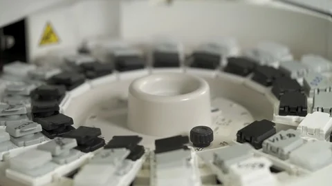 Samples carousel into automated chemistry analyzer in medical laboratory. Stock Footage 108456081