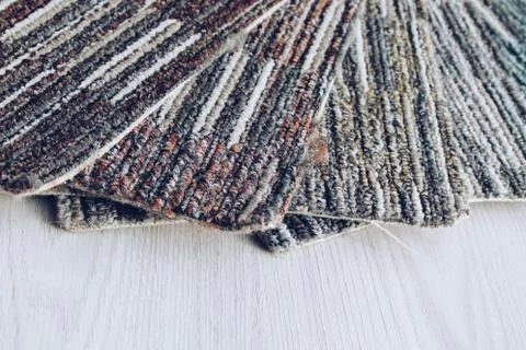 Samples of carpet bundle. Examples of multi-colored carpet in a swatch. Stock Photos