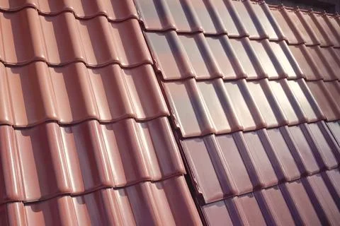 Samples of ceramic roofing tiles in a warehouse of a roofing mat Stock Photos