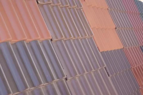 Samples of ceramic roofing tiles in a warehouse of a roofing mat Stock Photos