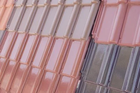 Samples of ceramic roofing tiles in a warehouse of a roofing mat Stock Photos