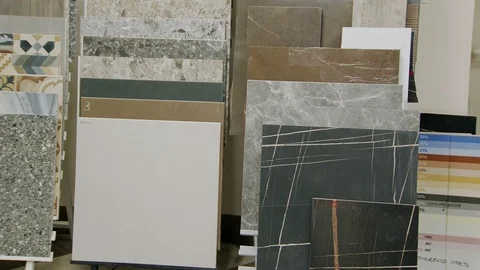 Samples of ceramic tile with different design, colours and patterns in warehouse Video stock 104939643