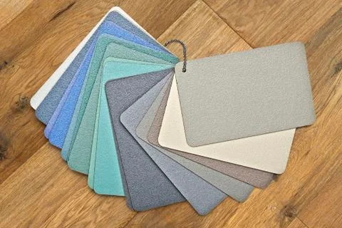 Samples of collection textured and colored fabrics Stock Photos