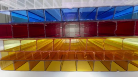 Samples of color cellular polycarbonate pieces stack Stock Footage 235350324