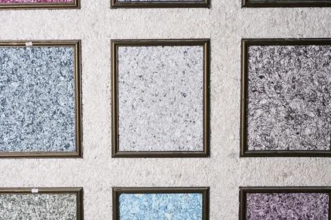 Samples of colored liquid wallpaper decorative plaster Stock Photos