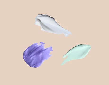 Samples of cream on a uniform background. Foto stock