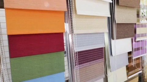 Samples of fabric shutters, window sunscreen. Camera movement from left to right Stock Footage 82230350