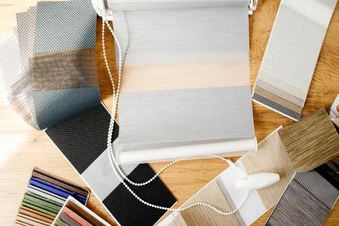 Samples of fabrics of different textures and colors in the form of a catalog  Stock Photos