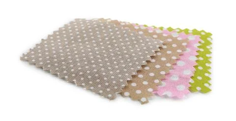Samples of fabrics with polka dot pattern isolated on white Fotos de archivo