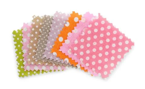Samples of fabrics with polka dot pattern isolated on white, top view Fotos de archivo
