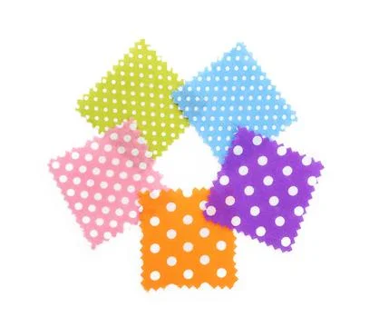 Samples of fabrics with polka dot pattern isolated on white, top view Stock Photos