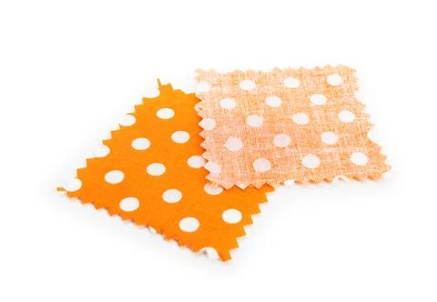 Samples of fabrics with polka dot pattern isolated on white Fotos Stock