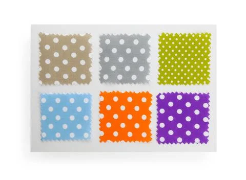 Samples of fabrics with polka dot pattern isolated on white, top view Stock Photos