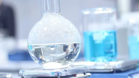 Samples in flasks in a modern advanced laboratory Stock Footage 87135823