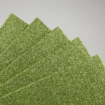 Samples of light green shiny foam sheets. Products for creativity. Stock Photos