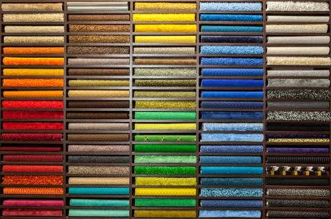Samples of multi-colored carpets Stock Photos