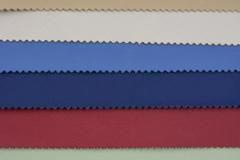 Samples of multicolored artificial leather. Stock Photos