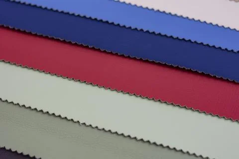 Samples of multicolored artificial leather. Stock Photos