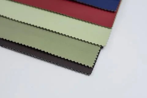 Samples of multicolored artificial leather. Stock Photos