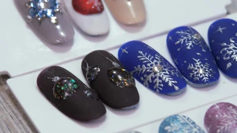 Samples of the nail pattern. Manicure samples on well-groomed hands and nails. Stock Footage 246500804
