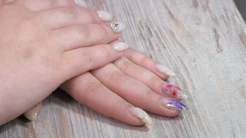 Samples of the nail pattern. Manicure samples on well-groomed hands and nails. Stock Footage 246500945