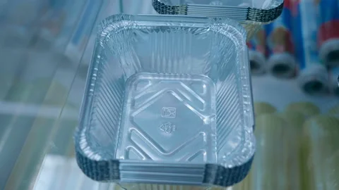 Samples of new aluminum foil containers for fast food and other uses Video stock 218330139