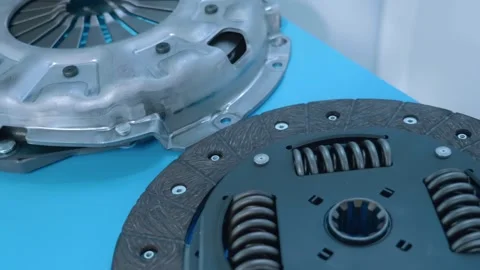 Samples of new automotive clutch baskets and discs for them at the exhibition Stock Footage 340459814