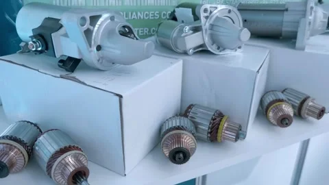 Samples of new automotive starters and rotors for them at the exhibition Stock Footage 340459561