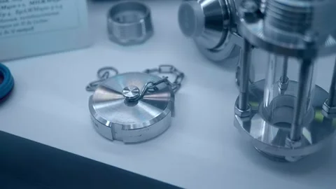 Samples of new precision metal parts are presented at the exhibition Stock Footage 340627288