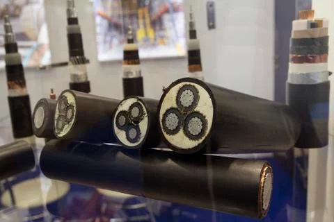 Samples of power electrical cables in the showroom. Industry Stock Photos