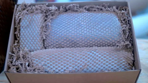 Samples of soft and lightweight paper material for the safe transport of parcels 스톡 동영상 218203210