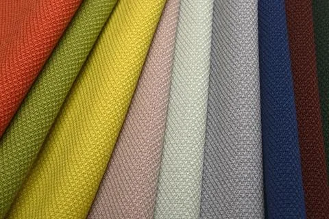 Samples of textiles of different colors Stock Photos