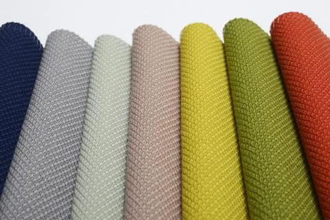 Samples of textiles of different colors Stock Photos