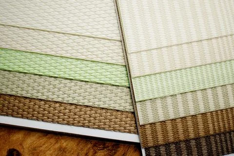 Samples of textured fabrics of different colors for the manufacture of fabric Foto stock