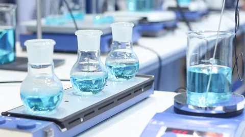 Samples of water in flasks in a modern laboratory Stock Footage 87135874